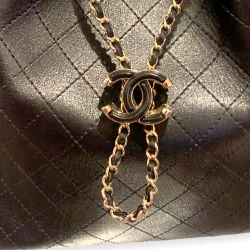 CHANEL Calfskin Stitched Drawstring Bag (Black)